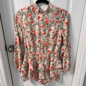 Long sleeve romper with gorgeous floral pattern. Size small!